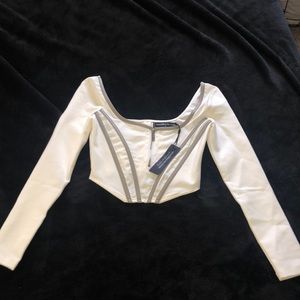 Long sleeve corset type top.